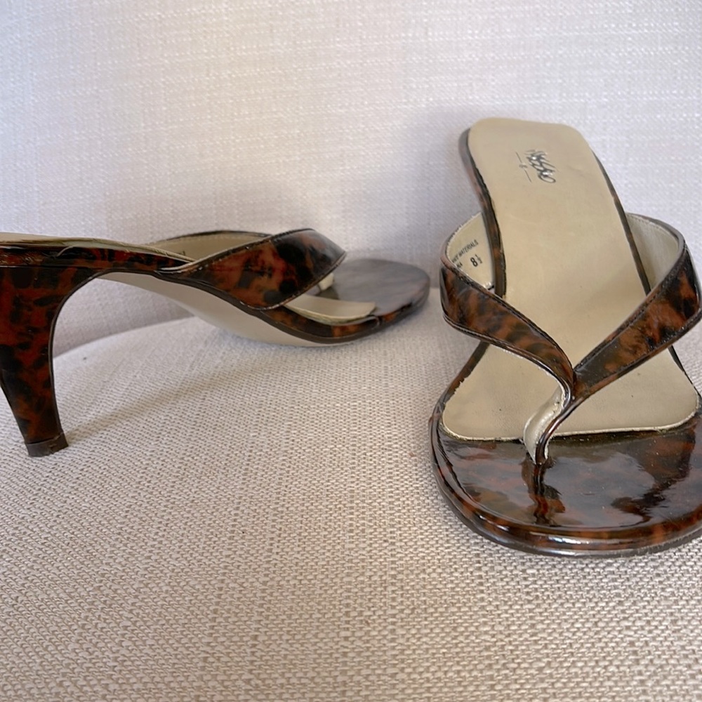 These are glass looking cheetah print high heels